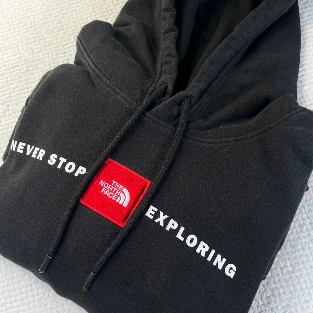 The North Face Mens Never Stop Exploring Black Hoodie Red Logo Patch XL